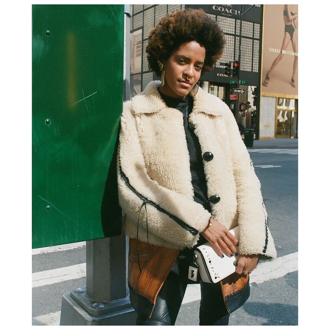 Meet Coco, one half of the DJ/producer/entrepreneur/twin sister duo @cocoandbreezy. “We grew up very shy and used our style as a form of expression.” She customized her Coach Dinky bag with a sprinkle of Prairie Rivets. What will you add on? Discover all the #CoachCreate possibilities through link in bio. #CoachNY