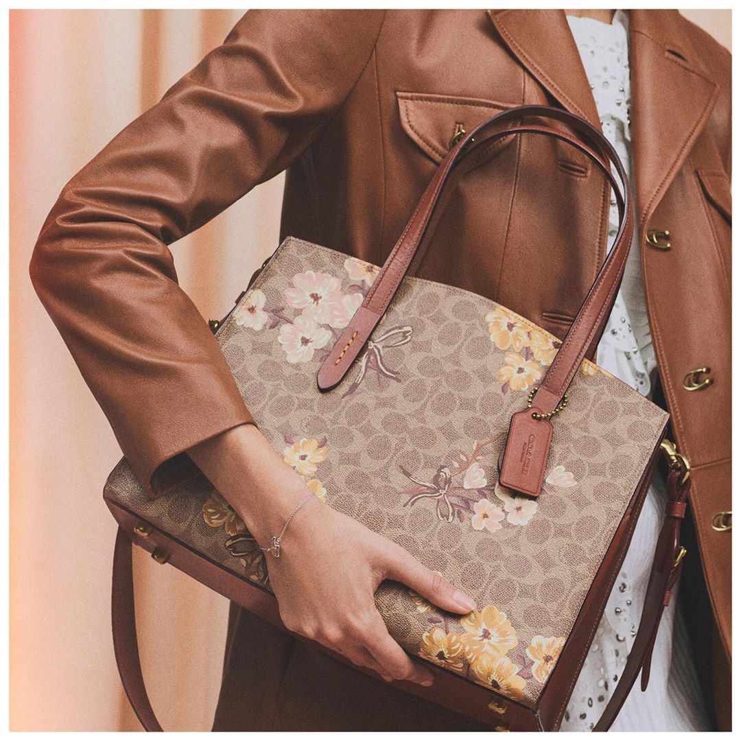 She's a lovely multi-tasker—both Mom and spring's Charlie carry-all, reimagined in our Prairie Floral print. #MothersDay #CoachNY