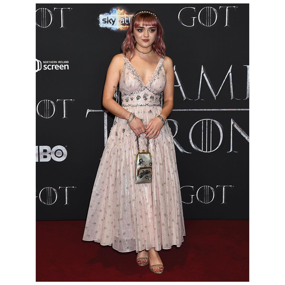She slays onscreen and off. #MaisieWilliams wore a custom blush pink, tea-length gown with vintage embroidery to the #GameofThrones premiere in Belfast. @stuartvevers #CoachNY