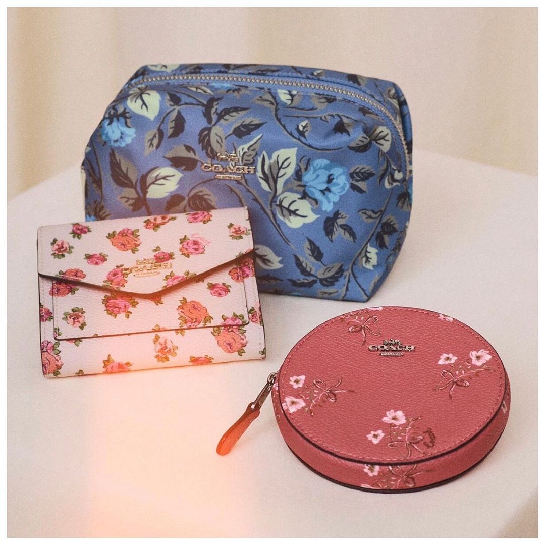Good things, small packages. Mom knows. Discover our garden of floral accessories.  #MothersDay #CoachNY