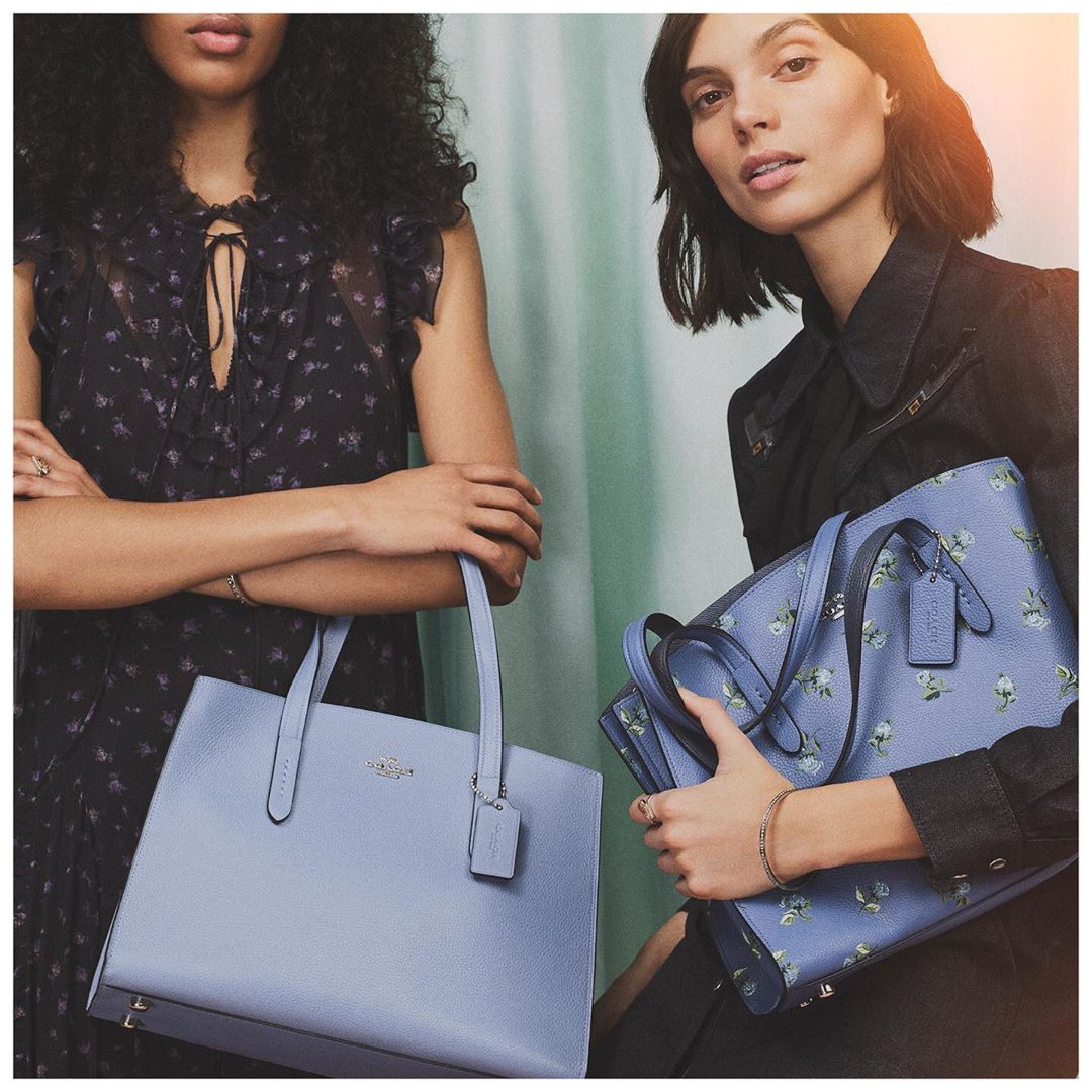 Two blues are better than one. Our Charlie Carryall in powder blue, aka, a color that acts like a neutral, or scattered with delicate blooms. #MothersDay #CoachNY