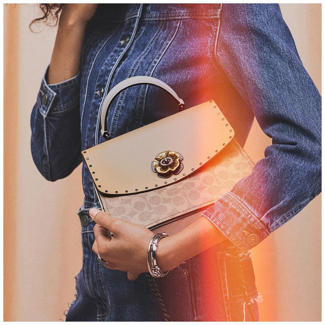 Secure the bag…and guarantee a happy Mom this Mother's Day. Shop our Signature Parker Top Handle and more #MothersDay gifts via the link in bio. #CoachNY