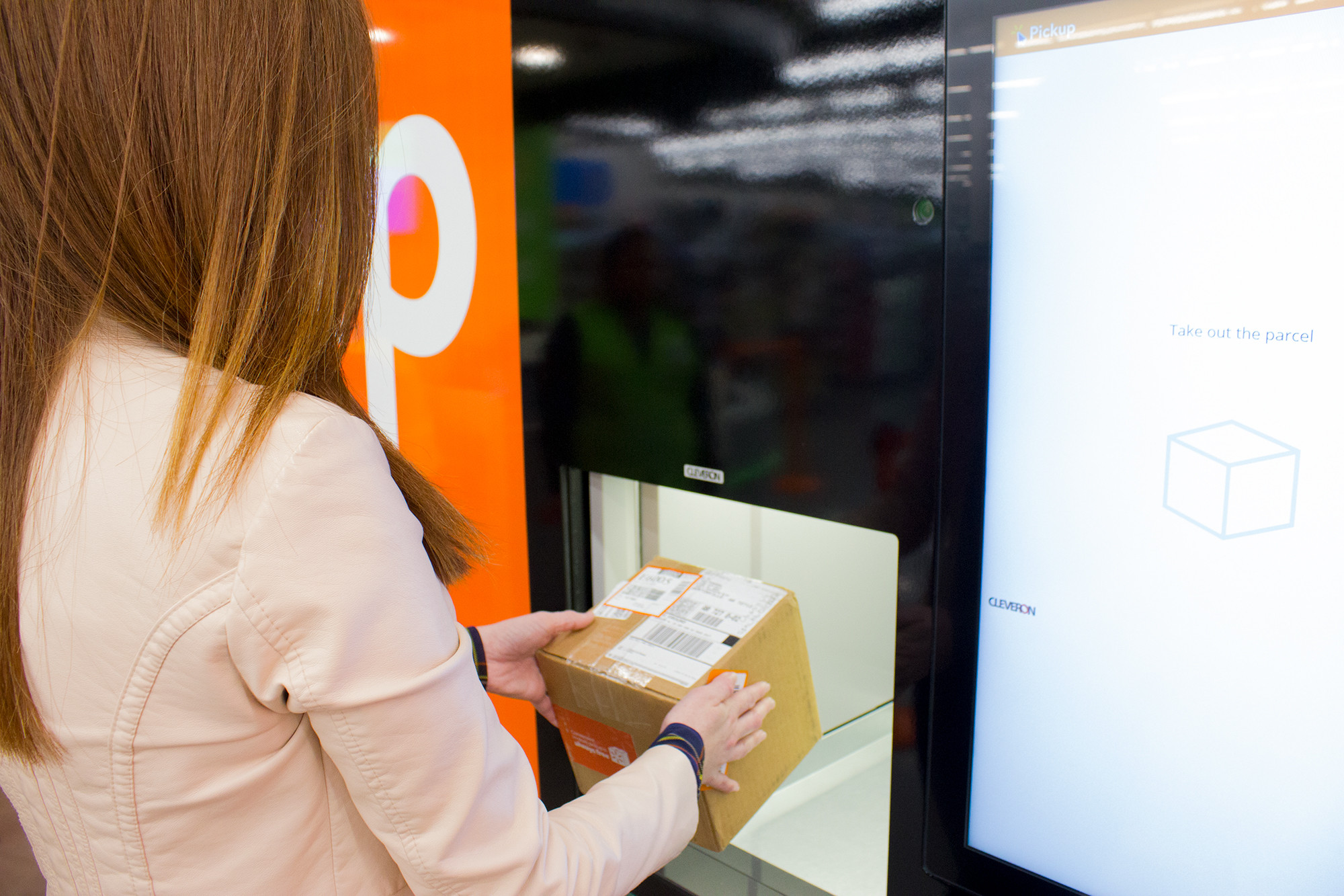 Walmart to expand in-store tech, including Pickup Towers for online orders and robots