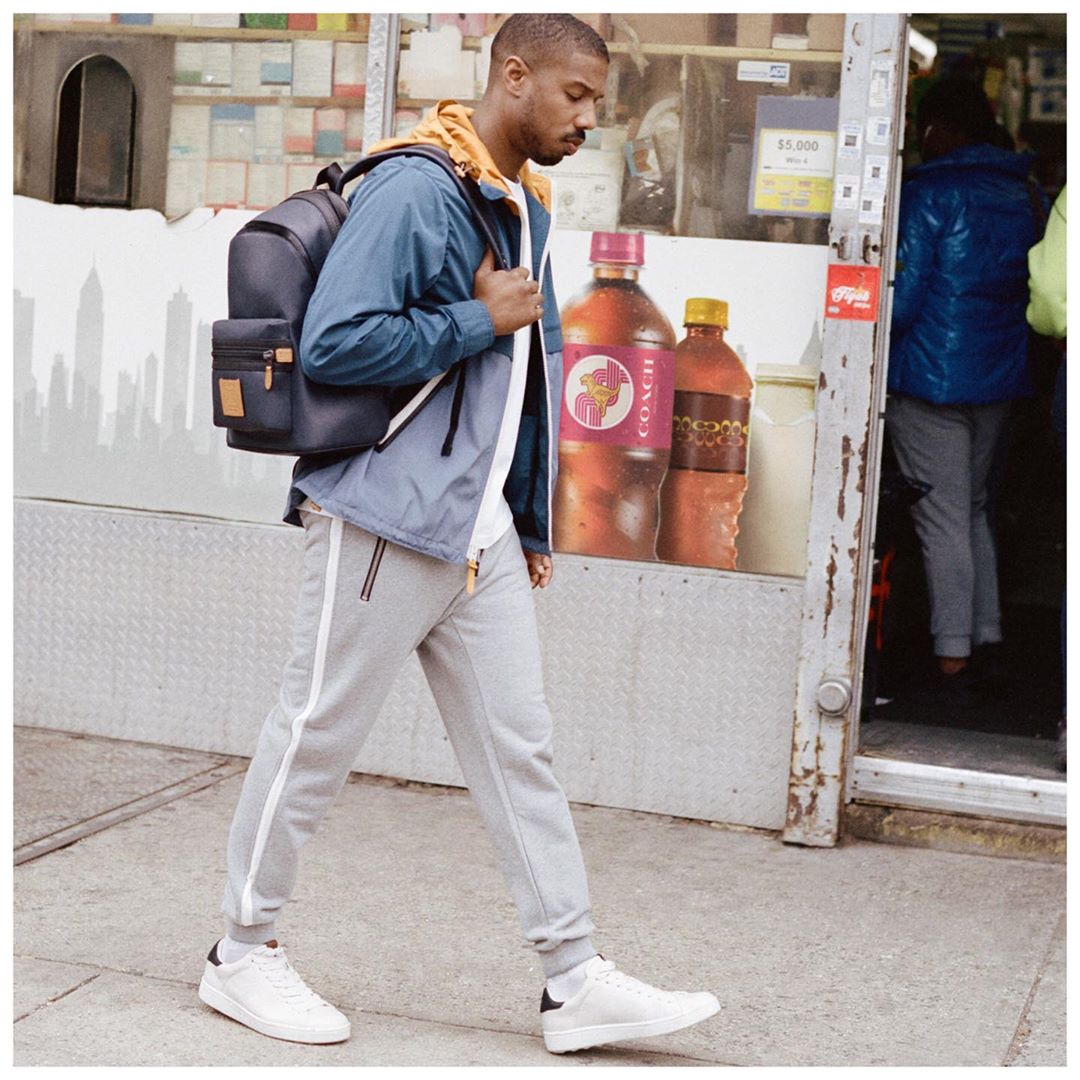 You can keep a low profile without sacrificing style. Make like #MichaelBJordan and pair a colorblocked windbreaker with cleanlined sneakers and trim track pants. #CoachNY