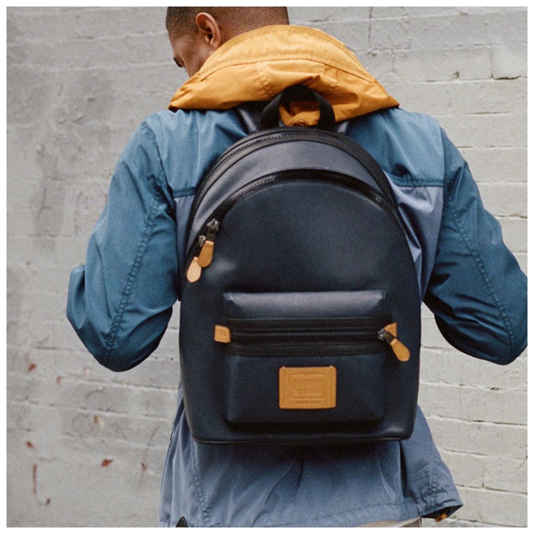That proverbial “pop of color”—yeah, we got that covered. #MichaelBJordan wears our new Academy Backpack old-school style—on both shoulders—for hands-free adventure.  #CoachNY
