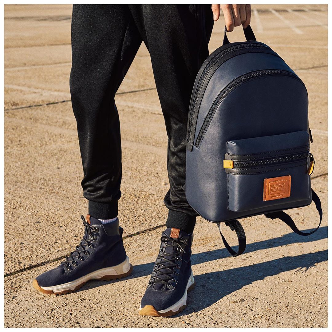 The right pair. Our Hybrid Urban Hiker (built like a boot, feels like a sneaker) finds its match with the Academy colorblock backpack. #CoachNY