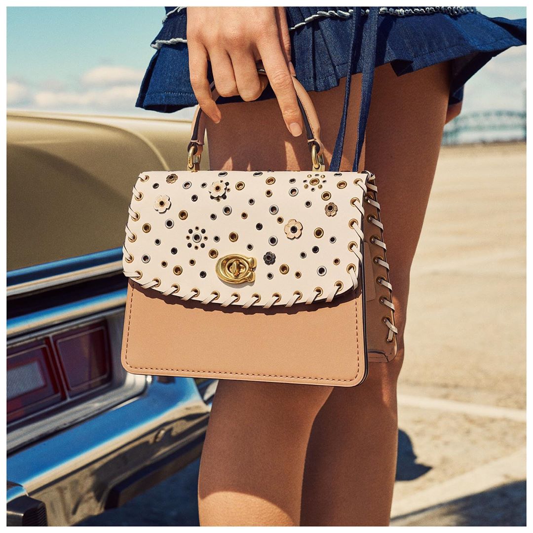 In refined colorblock leather, the Scattered Rivets Parker Top Handle is pretty with a little punk for good measure. #CoachNY