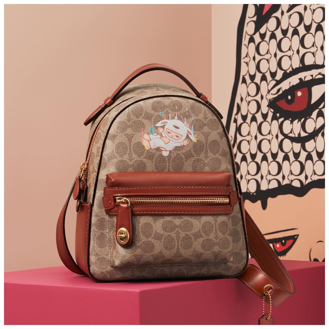 Oh baby! “My artwork was inspired by my daughter, who was born with curiosity,” says artist @AlexFaceBkk of his trademark character, who cuddles up on our limited-edition Campus backpack. Quirky, cute and slightly other-wordly, this babe is going places. #CoachCreate #CoachNY . . . You’re invited to The Art of Signature Pop-Up in NYC. An interactive experience with free product customization by creatives, daily entertainment and sweet treats. Plus, if you’re a @Visa_Us card holder you’ll receive a gift with purchase while supplies last. The Plaza at Hudson Yards, 10AM – 8PM Monday – Saturday, 10AM – 7PM Sunday, Until July 17th. C you there!