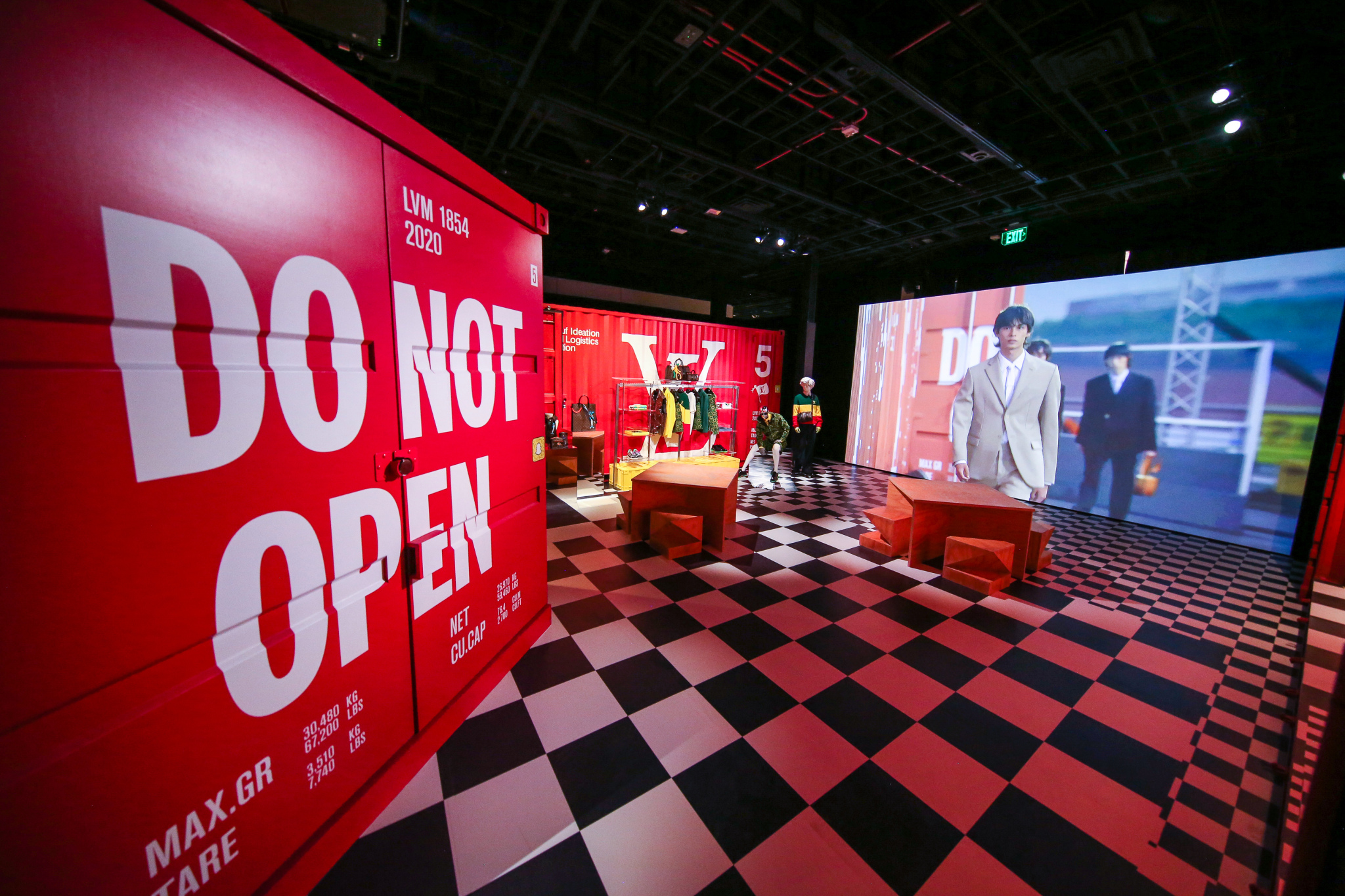 See inside Louis Vuitton’s men’s pop-up store that is complete with spring looks and $100K shipping containers