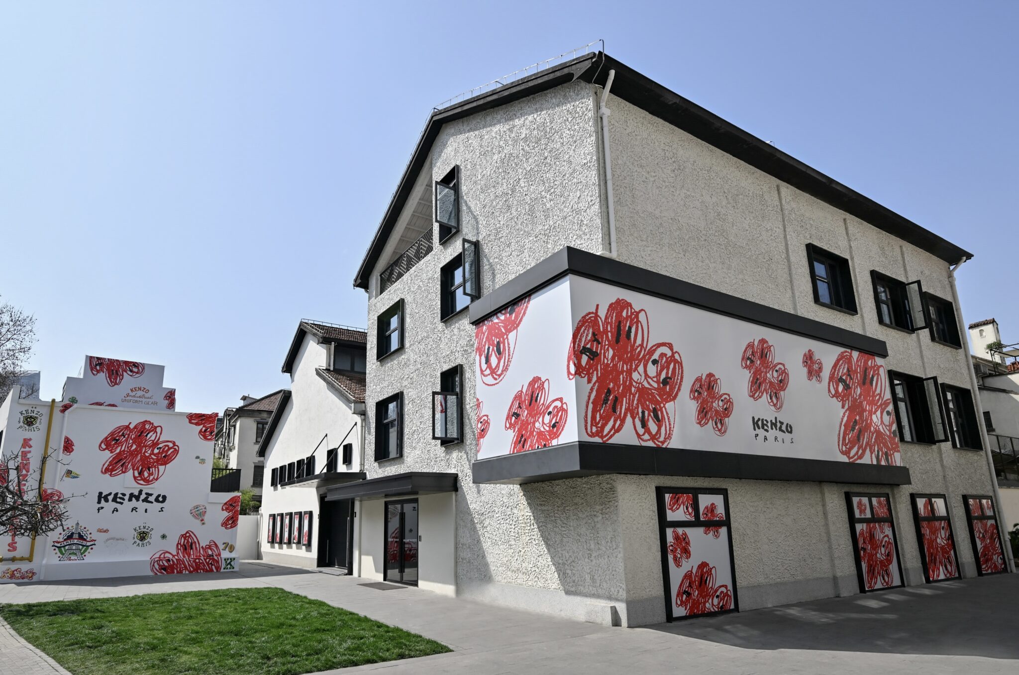 Kenzo Brings Hand-Drawn Quince Blossoms to Three Cities