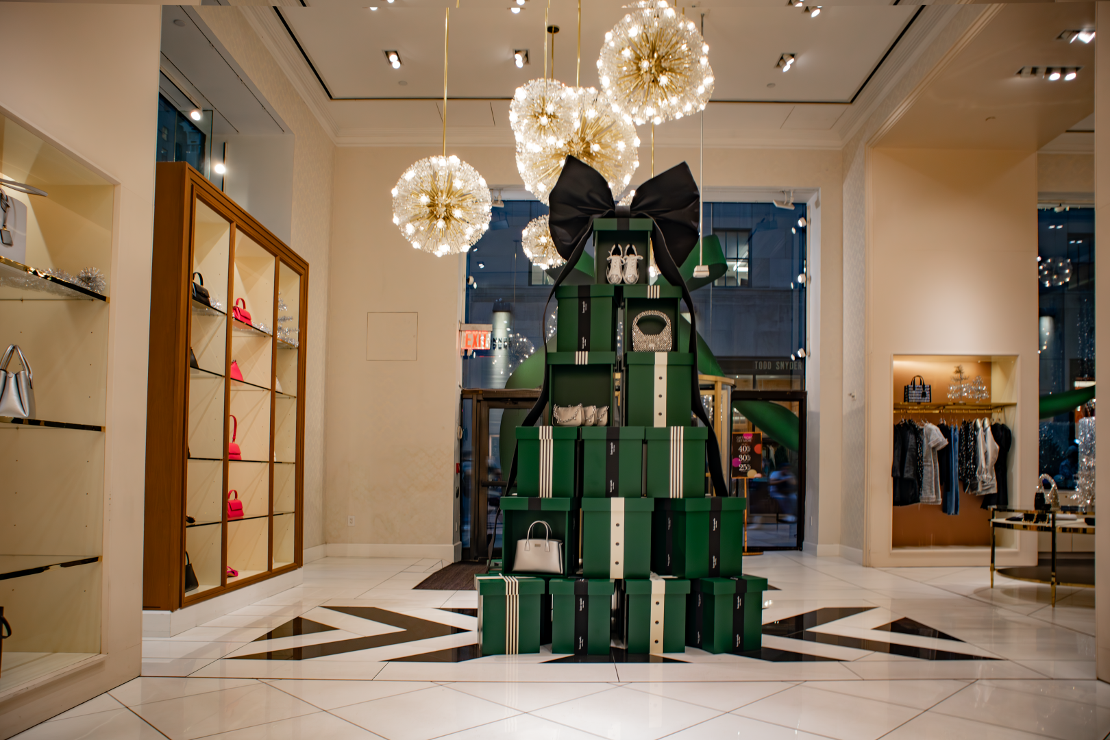 Kate Spade’s Festive Holiday Installation: A Chic Green Box Christmas Tree Kate Spade Holiday Installation