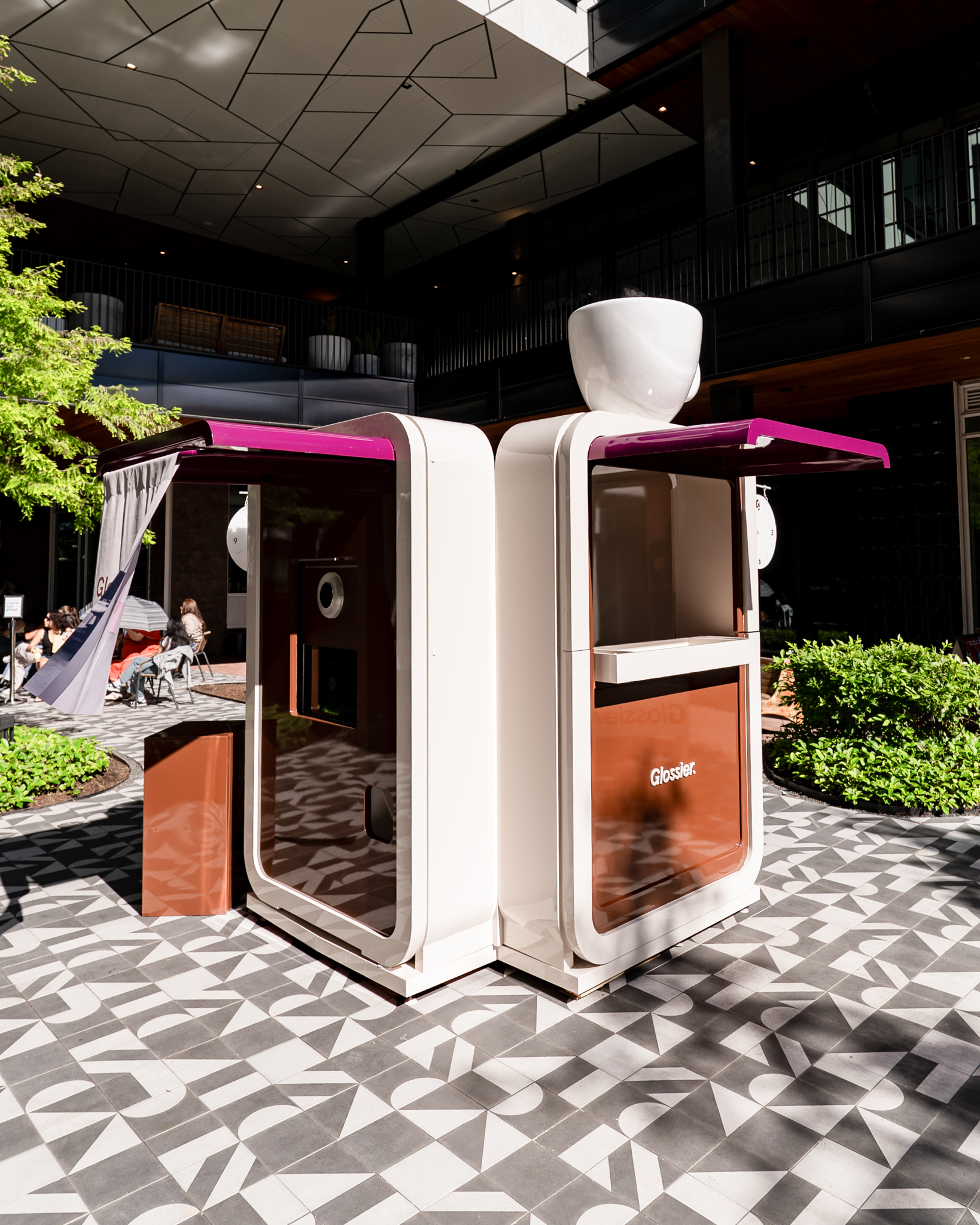 Glossier Hits the Road in Houston with Espresso-Inspired Photo Booth Installation