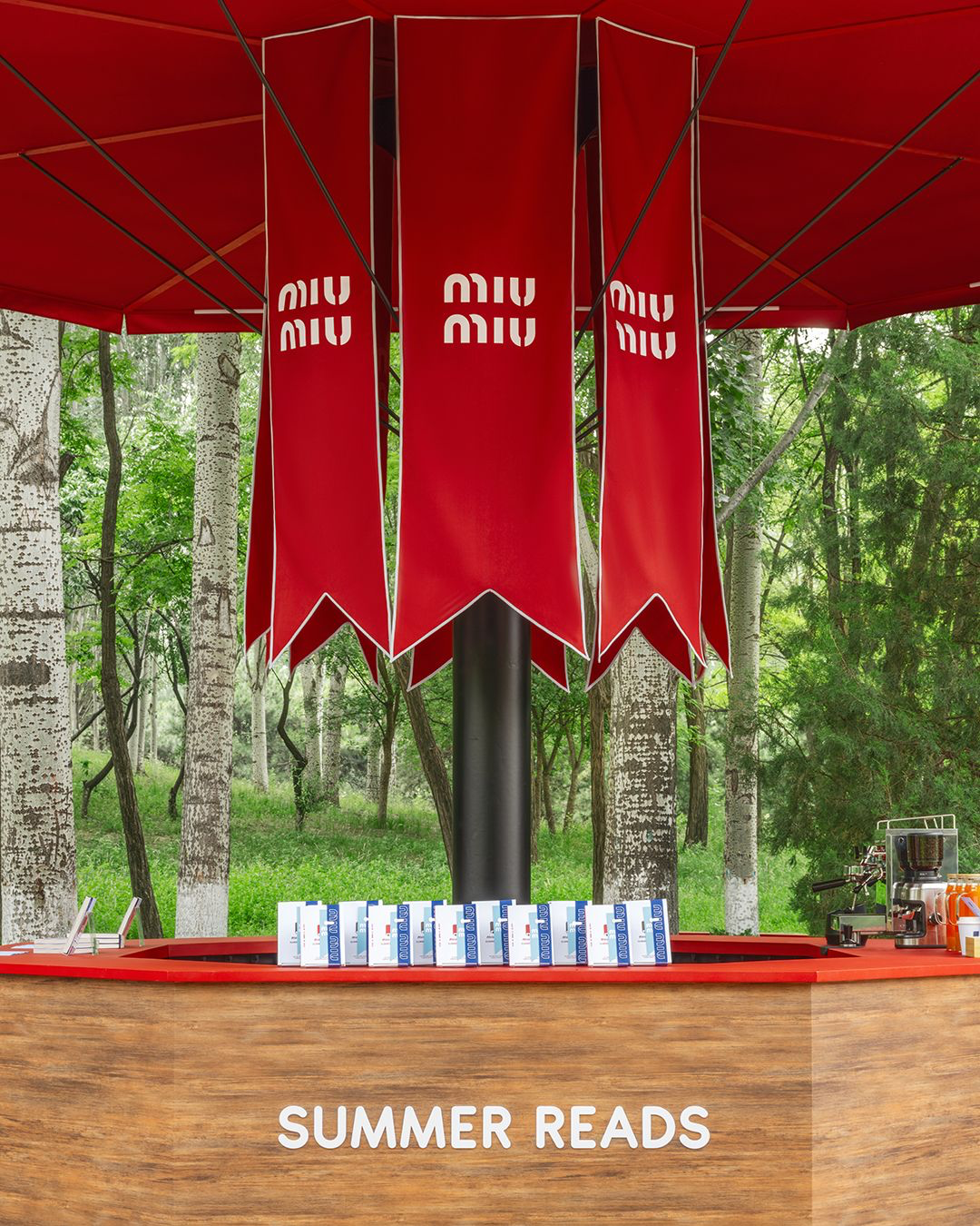 Miu Miu Summer Reads Transforms Global Green Spaces into Literary Sanctuaries